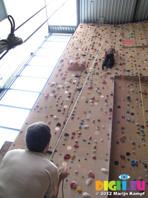 SX24167 Wouko securing Marijn on climbing wall